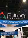 Fulton Electrical Booth Charging a Tesla at CES 2011